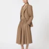 Falda midi de tejido de lana, color avellana Falda midi de tejido de lana, color avellana