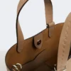 Bolso Archetipo extrapequeño de piel, color barro Bolso Archetipo extrapequeño de piel, color barro