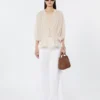 Bolso marino extrapequeño con tejido trenzado en forma de rombos, color marrón ámbar Bolso marino extrapequeño con tejido trenzado en forma de rombos, color marrón ámbar