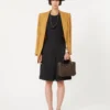 Bolso marino extrapequeño con tejido trenzado en forma de rombos, marrón oscuro Bolso marino extrapequeño con tejido trenzado en forma de rombos, marrón oscuro