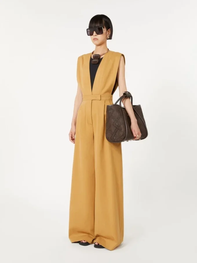 Bolso pequeño de estilo marino con tejido trenzado en forma de rombos, marrón oscuro
