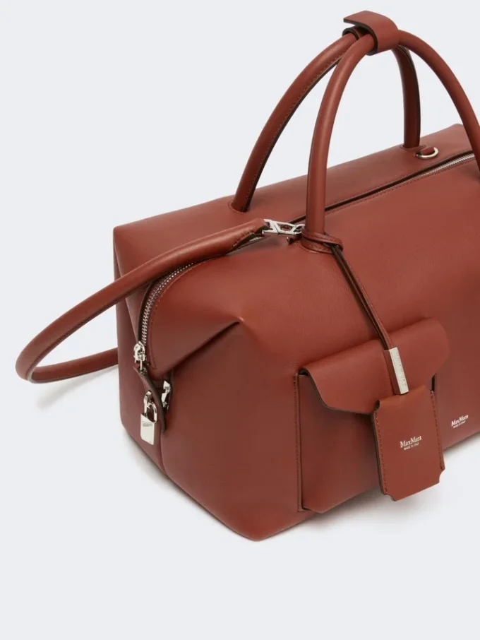 Bolso tipo boston grande de piel con bolsillos, color óxido