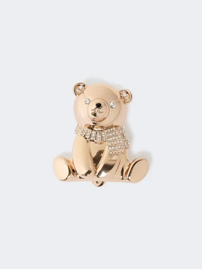 Broche de metal con pedrería,