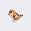 Broche de metal con pedrería,