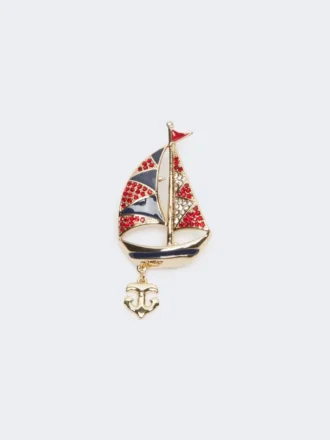 Broche de metal con pedrería, azul cielo