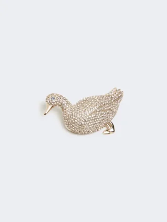 Broche de metal con pedrería, blanco óptico