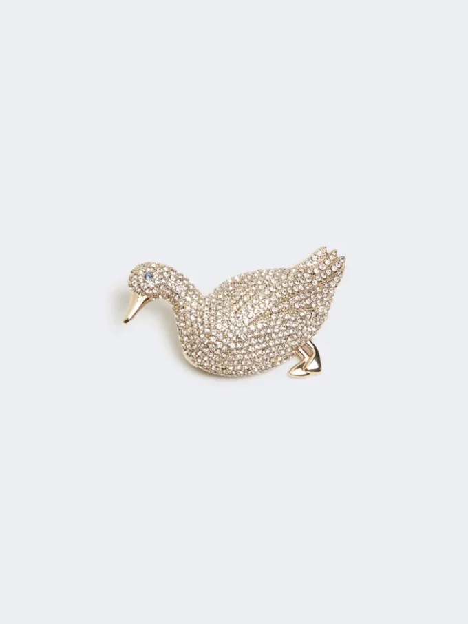 Broche de metal con pedrería, blanco óptico Broche de metal con pedrería, blanco óptico