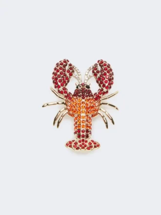 Broche de metal con pedrería, rojo oscuro