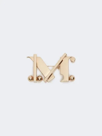 Broche metálico con monograma, dorado