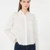 Camisa de algodón con bolsillo en el pecho, color marfil
