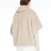 Capa de alpaca y tejido de lana teddy, color beige Capa de alpaca y tejido de lana teddy, color beige
