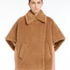 Capa de tejido teddy, color camel Capa de tejido teddy, color camel