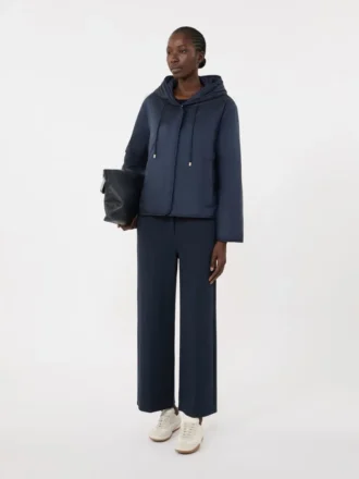 Chaqueta acolchada con capucha de lona repelente al agua, azul marino