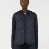 Chaqueta acolchada con capucha de lona repelente al agua y jersey, azul marino