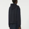 Chaqueta acolchada con capucha de lona repelente al agua y jersey, azul marino