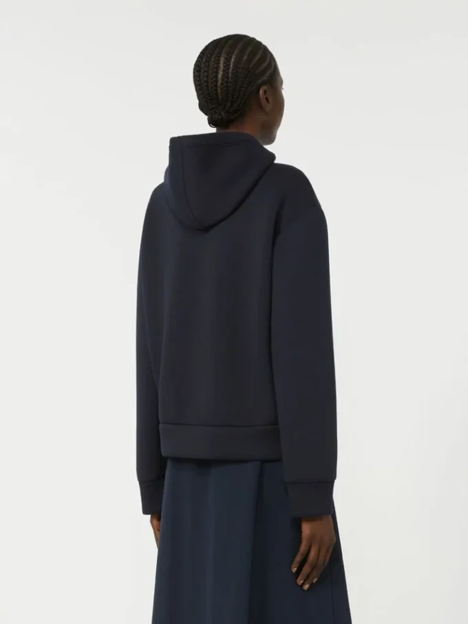 Chaqueta acolchada con capucha de lona repelente al agua y jersey, azul marino