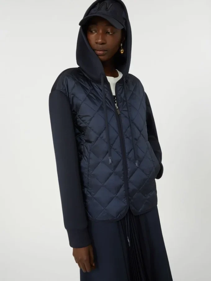 Chaqueta acolchada con capucha de lona repelente al agua y jersey, azul marino