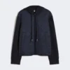 Chaqueta acolchada con capucha de lona repelente al agua y jersey, azul marino