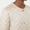 Chaqueta acolchada de lona repelente al agua con cuello redondo, color natural Chaqueta acolchada de lona repelente al agua con cuello redondo, color natural