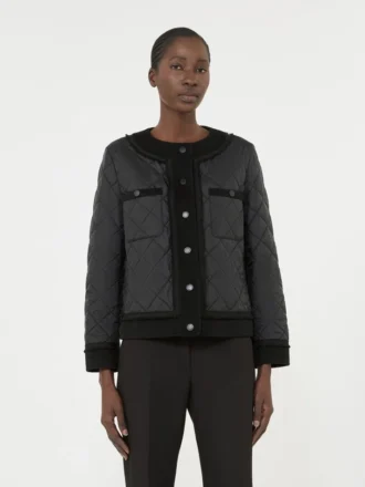 Chaqueta corta acolchada de lona repelente al agua, negra