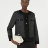 Chaqueta corta acolchada de lona repelente al agua, negra Chaqueta corta acolchada de lona repelente al agua, negra