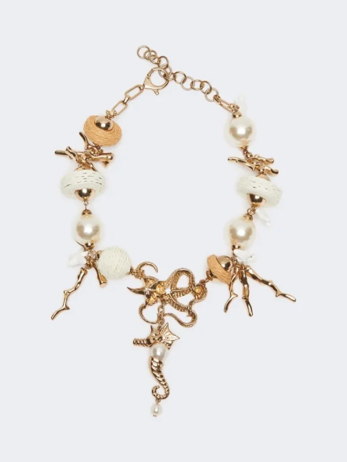 Collar gargantilla «Abissi» de metal y rafia, dorado Collar gargantilla «Abissi» de metal y rafia, dorado