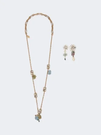 Conjunto con detalles de flores y cristales, dorado