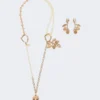 Conjunto con dijes y cristales, dorado Conjunto con dijes y cristales, dorado