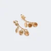 Conjunto con dijes y cristales, dorado Conjunto con dijes y cristales, dorado