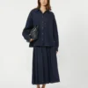 Falda plisada de denim, azul marino Falda plisada de denim, azul marino