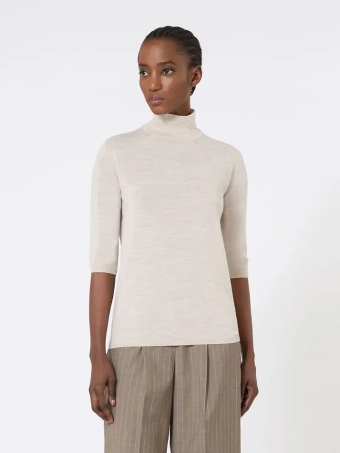 Jersey de cuello alto de punto jersey de lana, color polvo Jersey de cuello alto de punto jersey de lana, color polvo