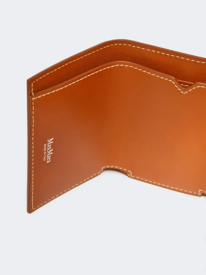 Monedero de piel de tres pliegues, color óxido Monedero de piel de tres pliegues, color óxido