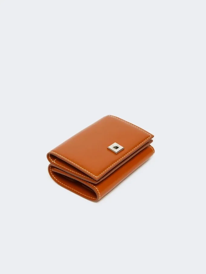 Monedero de piel de tres pliegues, color óxido Monedero de piel de tres pliegues, color óxido