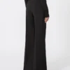Pantalones acampanados de tejido de lana elástico, negros Pantalones acampanados de tejido de lana elástico, negros