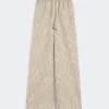 Pantalones anchos de lona de algodón y seda a rayas, color beige Pantalones anchos de lona de algodón y seda a rayas, color beige