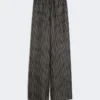 Pantalones anchos de seda estampada, negro y blanco Pantalones anchos de seda estampada, negro y blanco