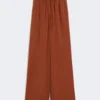 Pantalones anchos de seda lavada, color terracota Pantalones anchos de seda lavada, color terracota
