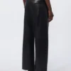 Pantalones de tejido recubierto, negros Pantalones de tejido recubierto, negros