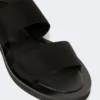 Sandalias planas de piel y tejido elástico, negro Sandalias planas de piel y tejido elástico, negro